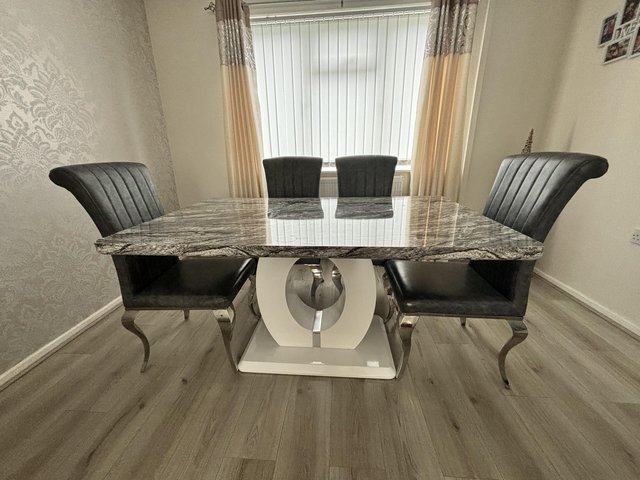 Preview of the first image of Marble Effect Dining Table and Chairs.