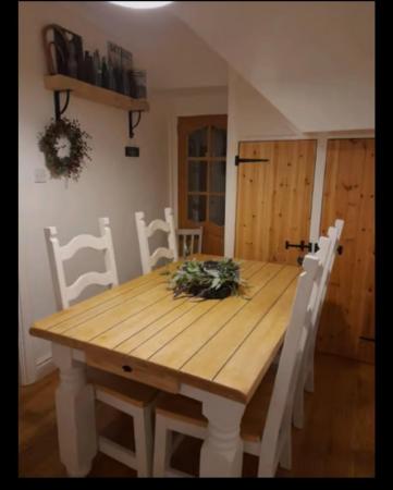 Image 1 of Solid wooden table and chairs for sale