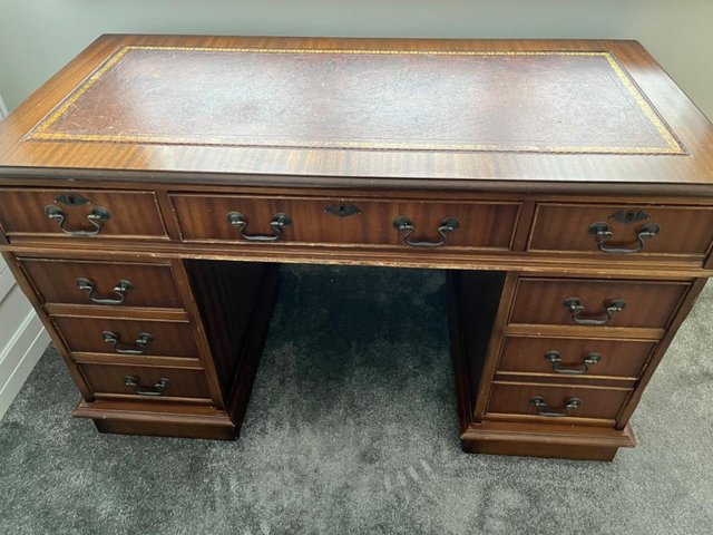 Preview of the first image of Antique leather inlaid desk.