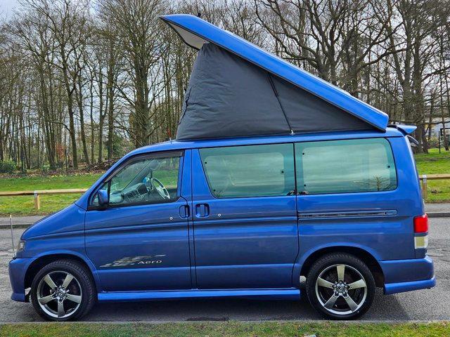 Preview of the first image of Mazda Bongo Camervan with full rear conversion & pop up roof.