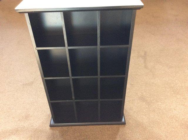 Preview of the first image of Small black china display unit.