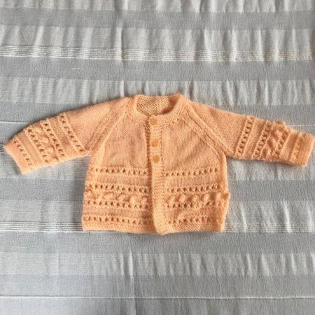 Image 1 of UNWORN vintage 1990's peach hand-knitted matinee jacket.