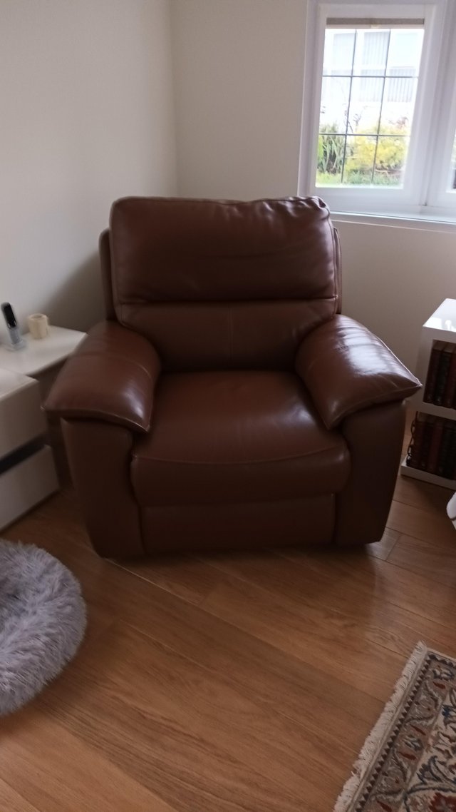 Preview of the first image of Faux leather reclining chair.