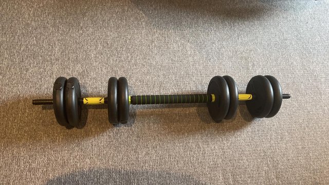 Preview of the first image of Weight lifting pieces with bar.