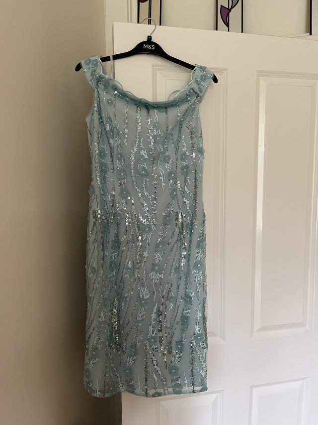 Preview of the first image of Adrianne Papell Dress. Size 12. True to size. Sea blue..