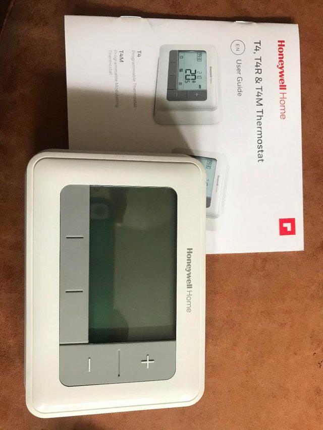 Preview of the first image of HONEYWELL T4 PROGRAMMABLE THERMOSTAT - LIKE NEW.