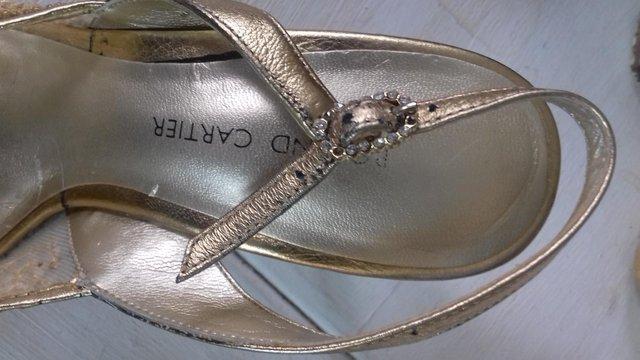 Preview of the first image of Ladies Elegant Gold Sandals......