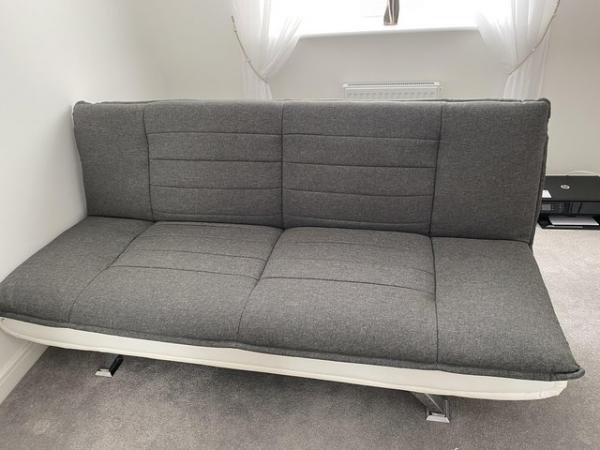 Image 3 of Charcoal grey material sofabed with chrome legs