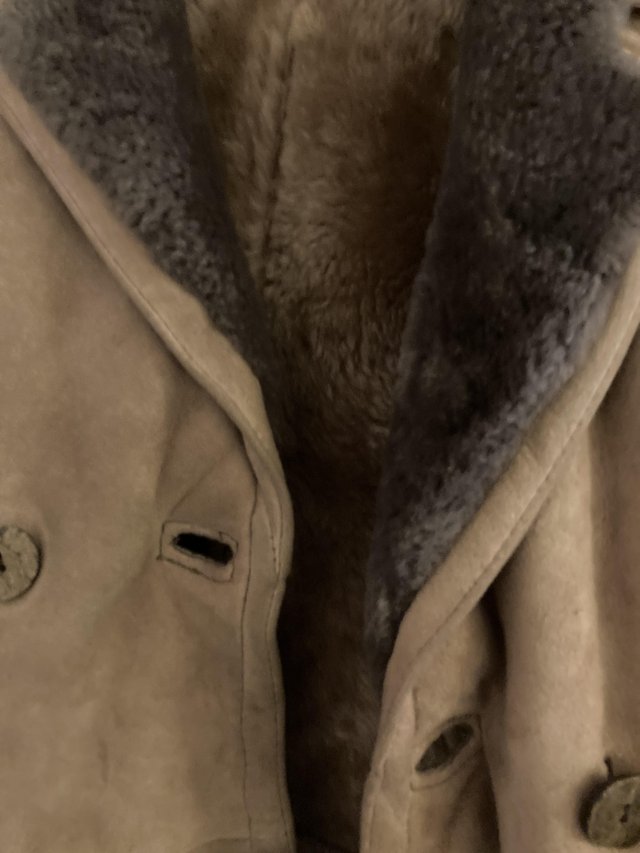 Preview of the first image of Size 8 Uk Lamb skin coat and small head matching hat.