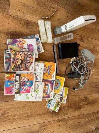 Image 1 of Nintendo Wii with 11 games & many discs