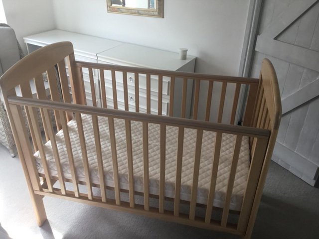 Preview of the first image of Mama and  papa  beech wood cot.