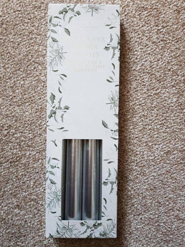 Preview of the first image of Laura Ashley Four Silver Dinner Candles.
