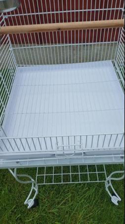 Image 7 of Large bird cage with stand , comes with perches , feeders
