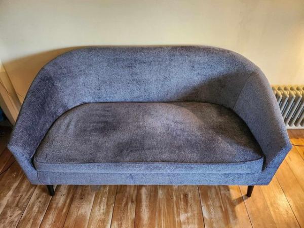 Image 1 of Blue 2 seater sofa in waffle fabric. Used for 3 months.