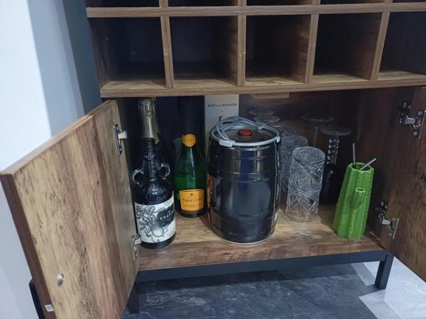 Image 2 of Drinks cabinet with storage and glass holder