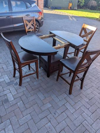 Image 1 of Dining table and 4 bar chairs with extension leaf