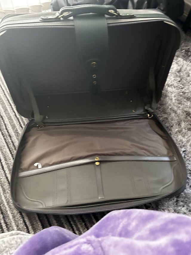 Preview of the first image of Medium size suitcase vgc uplift only baberton Edinburgh west.