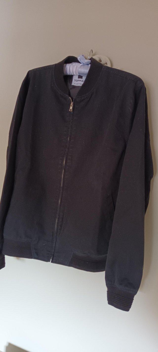 Preview of the first image of Mens TOPMAN jacket UK large in black.