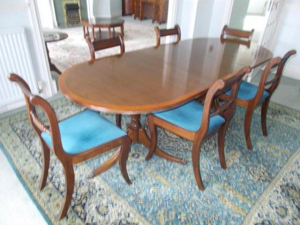 Image 1 of MAHOGANY EXTENDING DINNING TABLE/6 CHAIRS + SIDEBOARD.