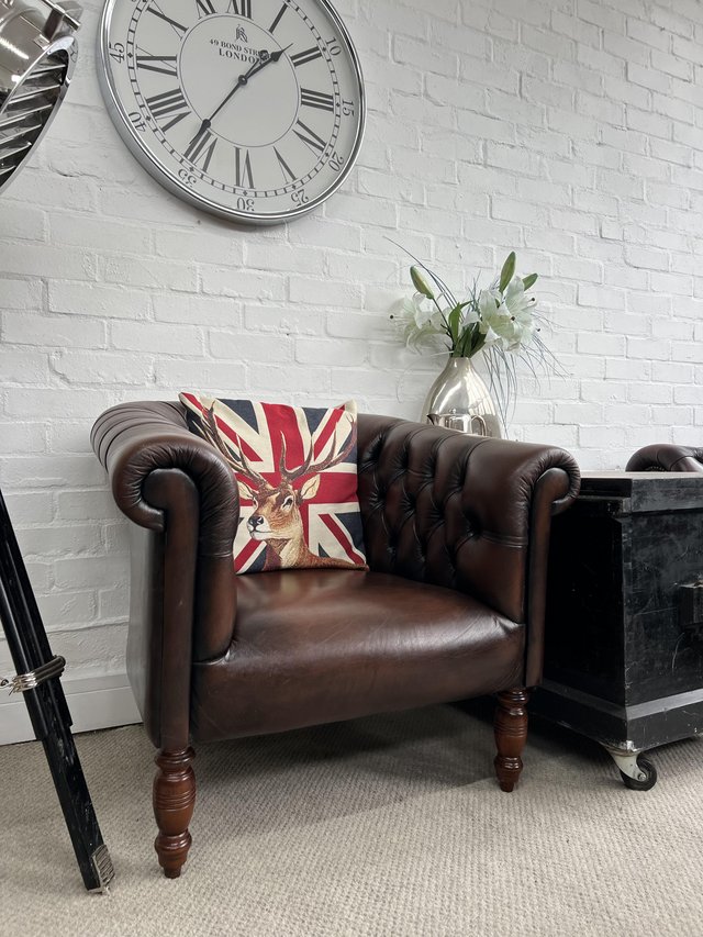 Preview of the first image of FLEMING & HOWLAND Chesterfield club armchair..