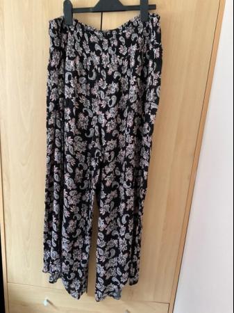 Image 1 of Trouser culottes size 16, shirred waist black and pink