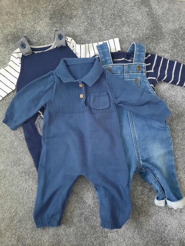 Preview of the first image of Baby boy dungaree bundle 0-3 months.