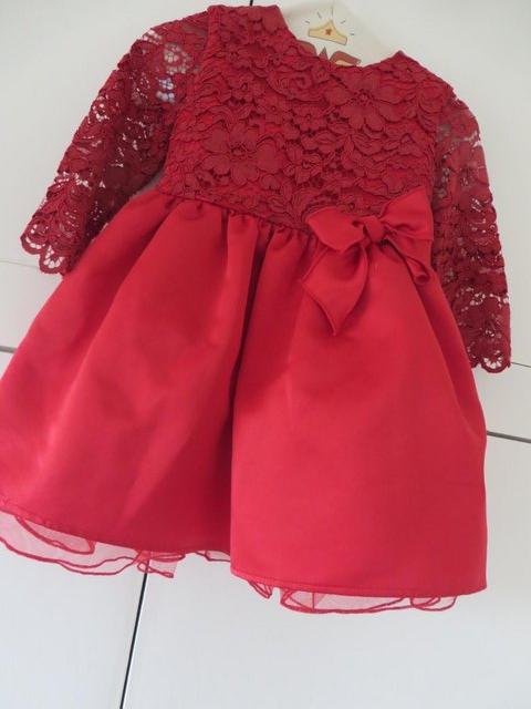 Preview of the first image of Italian make red  dress 18 months NEW with underskirts.