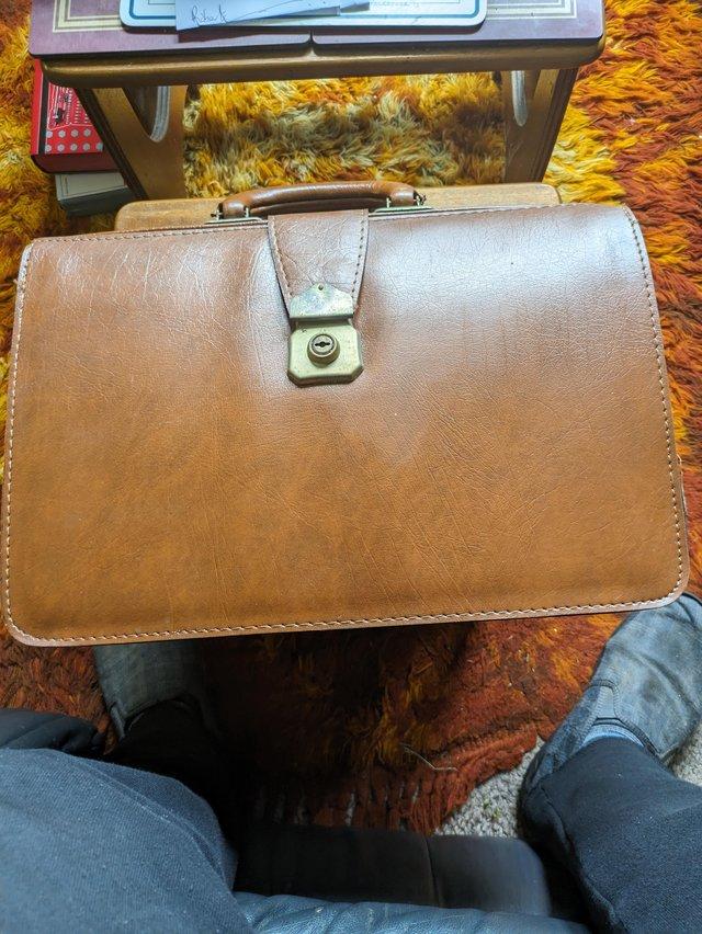 Preview of the first image of Unused vintage leather brief case..