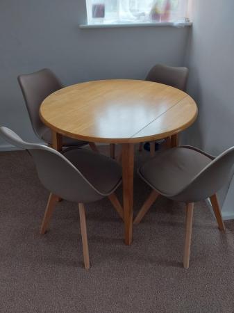 Image 1 of Round dining room table and chairs