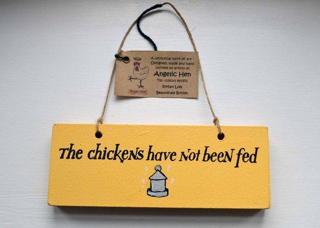 Preview of the first image of Useful double sided sign for the chickens being fed or not!.