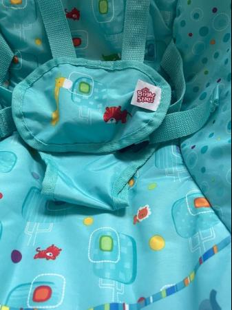 Image 3 of Bright Starts vibrating Baby Bouncer/chair. new cover