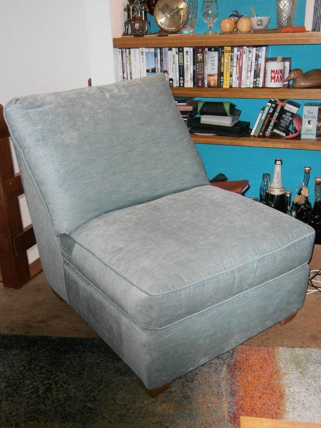 Preview of the first image of Modern lounge chair in blue fabric.