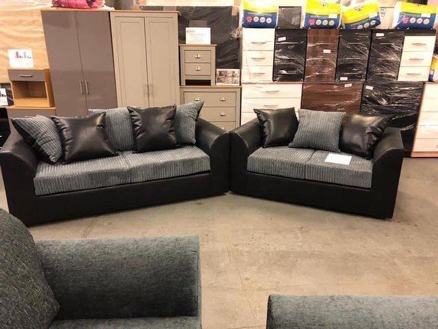 Preview of the first image of Byron 3&2 sofas in black snake with grey jumbo cord.