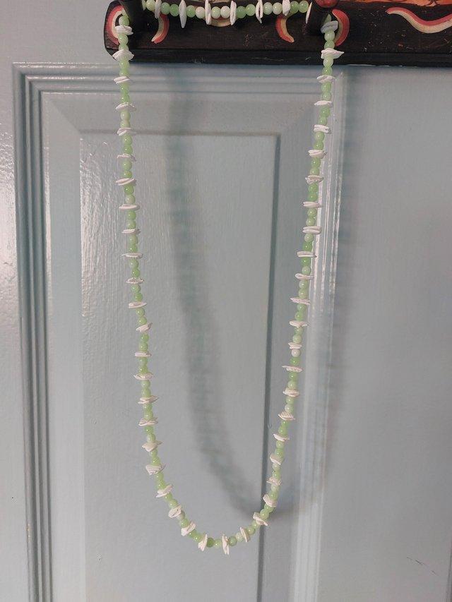 Preview of the first image of Green/white beaded necklace.