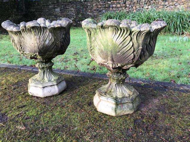 Preview of the first image of Pair of concrete tulip garden planters.