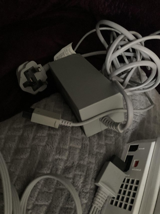 Preview of the first image of Wii console with games and 2 handsets.