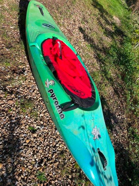Preview of the first image of Pyranha Kayak complete with paddle and spraydeck.