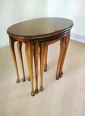 Image 2 of nest of 3 side tables in yew wood