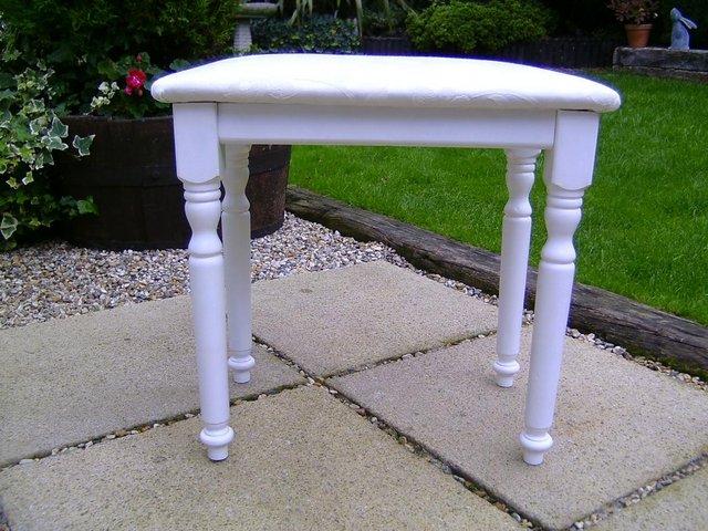 Preview of the first image of Wooden dressing table stool in white satin.
