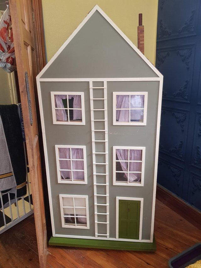 Preview of the first image of Hand made wooden 6ft dolls house.