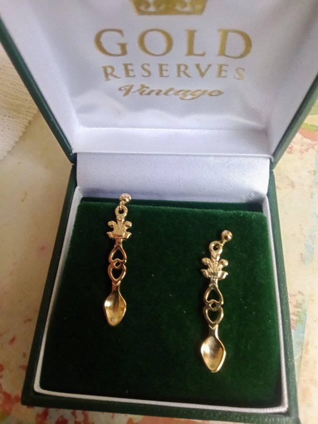 Preview of the first image of Lovespoon earrings  that are 9ct.