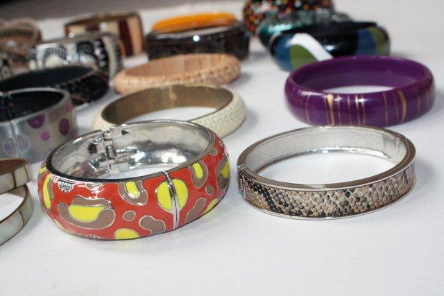 Image 3 of Women's 22 Assorted Bangles. Made of assorted materials.