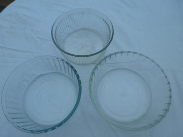 Image 1 of Three Pyrex dishes approx. seven inches in diameter