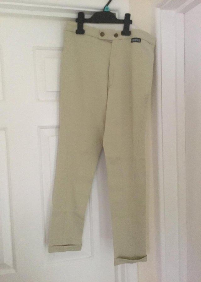 Preview of the first image of Gorringe Childs Jodhpurs, 28” waist, beige, new with label.