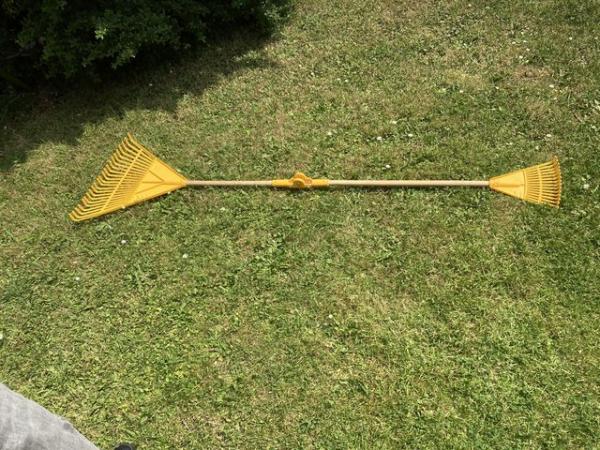Image 1 of A double ended, dual size rake/grabber