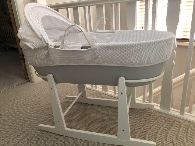 Preview of the first image of Moses basket- with rocking stand.