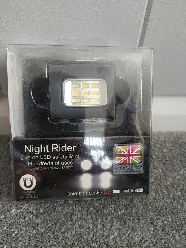 Preview of the first image of Equisafety Night rider LED clip on safety light - brand new.