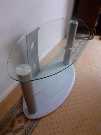 Image 2 of GLASS OVAL SHAPED TV STAND With a glassshelf