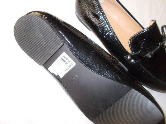 Preview of the first image of Robert Vianni slip ons, size 5.