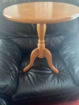 Image 1 of Coffee table on Three Legs made of wood.